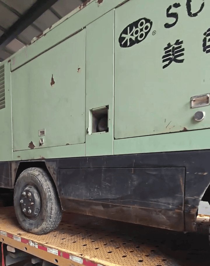 Left-side view of the used Sullair 780 portable air compressor
