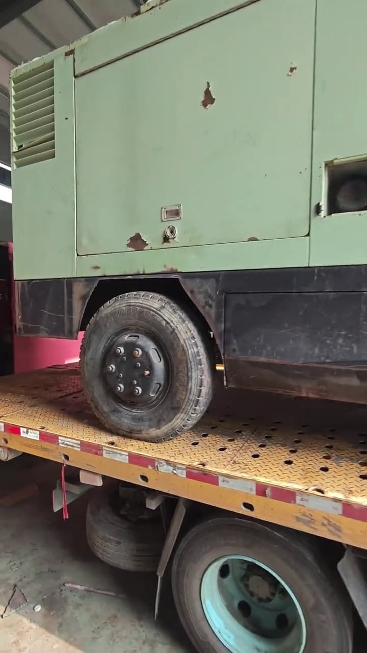 Left-side view of the used Sullair 780 portable air compressor