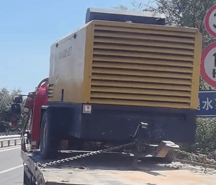 Rear view of used Tewatt diesel-powered mobile air compressor
