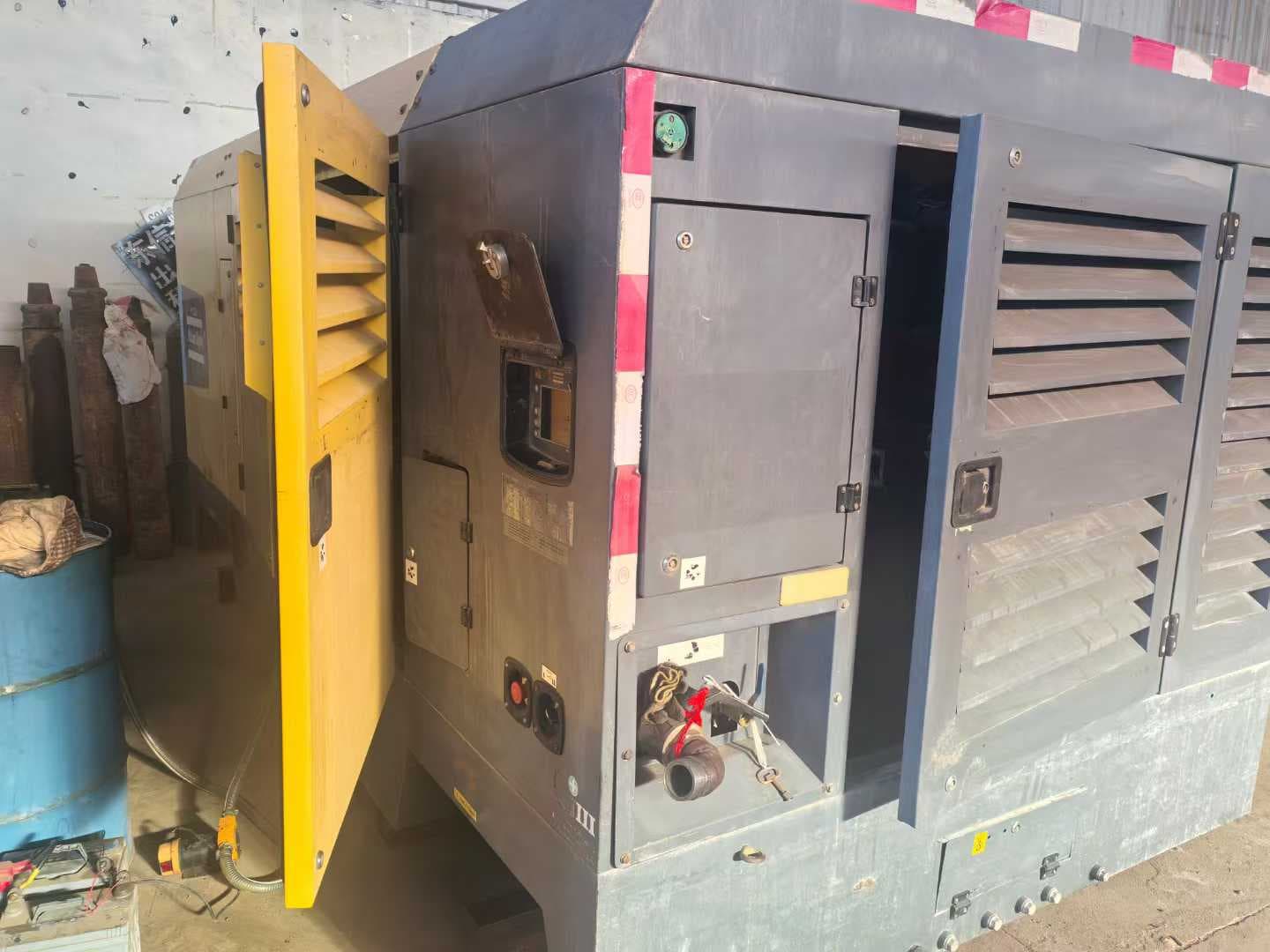 Rear-side view of the used V1200 portable compressor enclosure