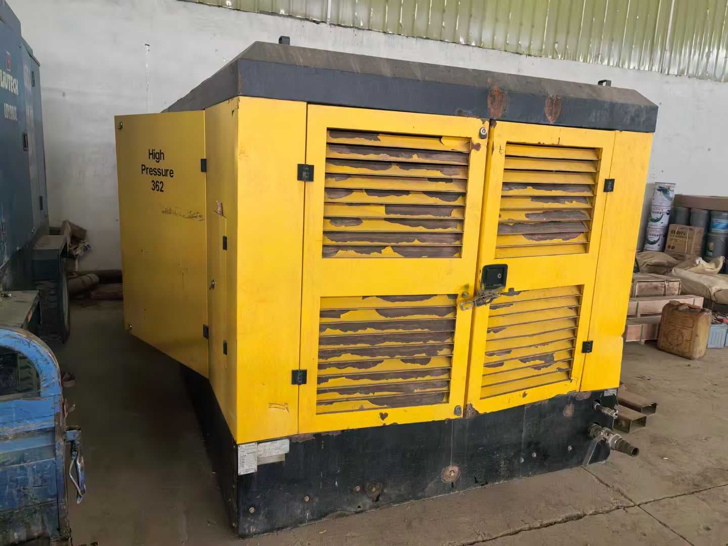 Rear enclosure and ventilation panels on the used high-pressure air compressor