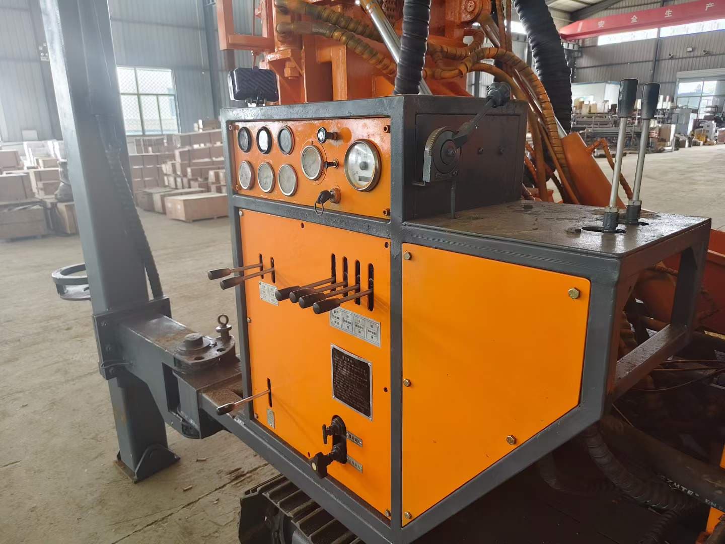 Operator controls and hydraulic gauges on the used Jinrui 350 drilling rig