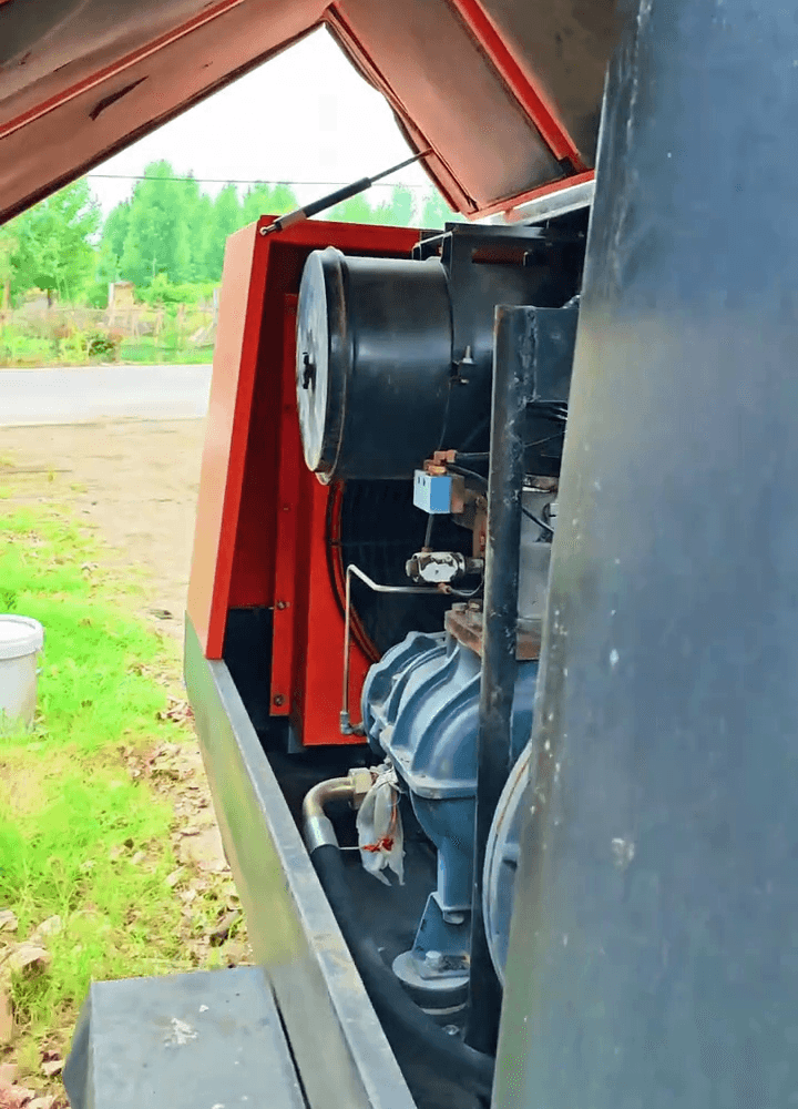 Kaishan 90 kW Air compressor with cabin and internal components opened
